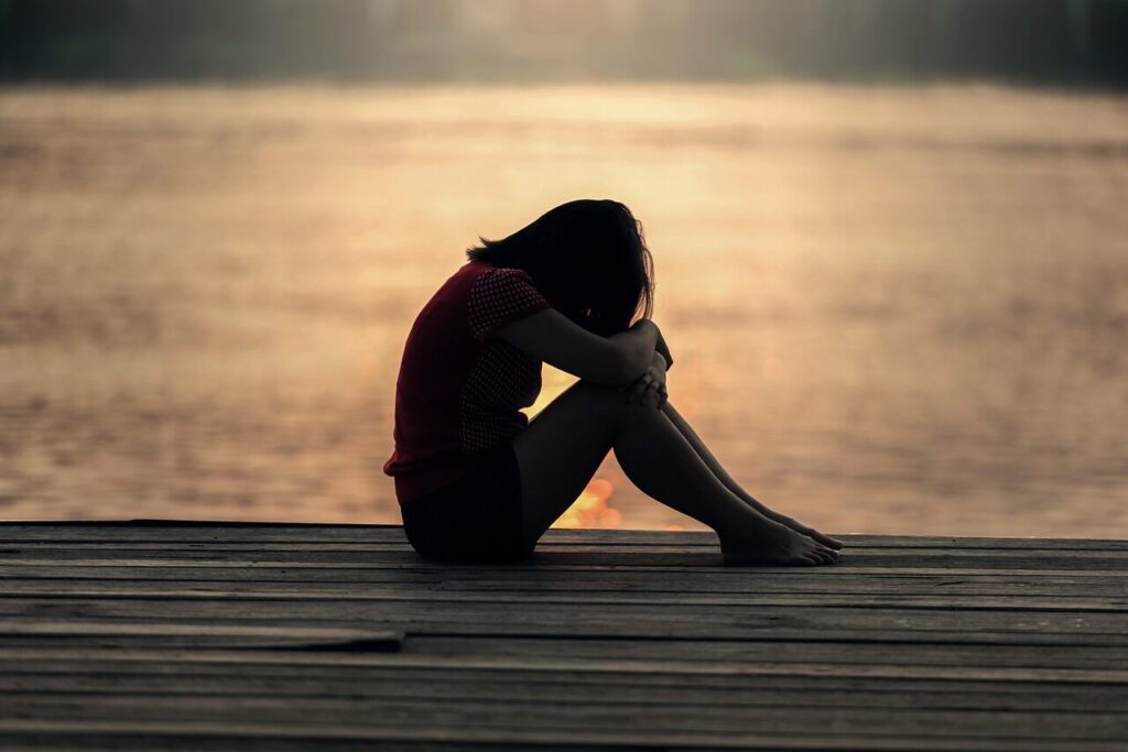 girl, sitting, jetty, docks, boardwalk, young woman, female, sad, alone, lonely, solitude, nature, sad girl, solitary, outdoors, sea, peaceful, silhouette, sunrise, sunset, teenager, water, woman